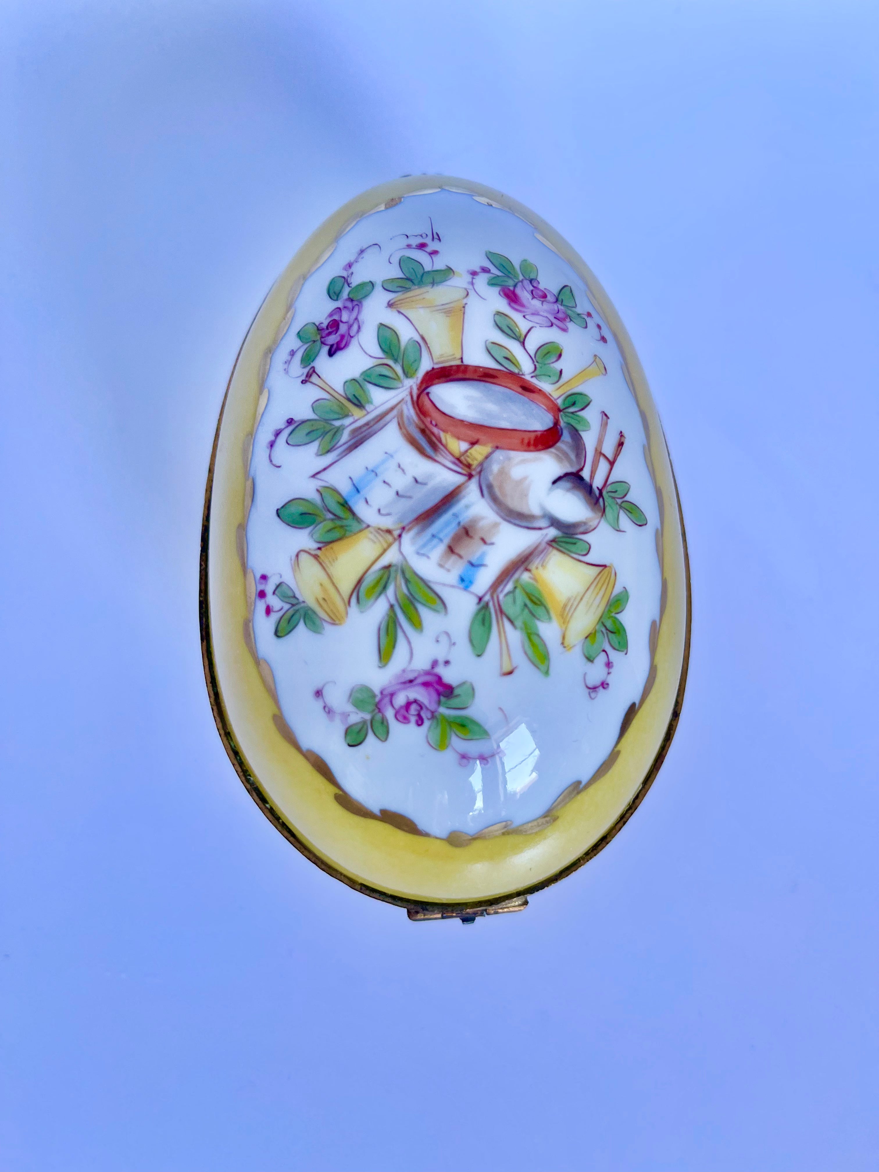 Limoges, France | Floral Musical Porcelain Oval Decorative Box